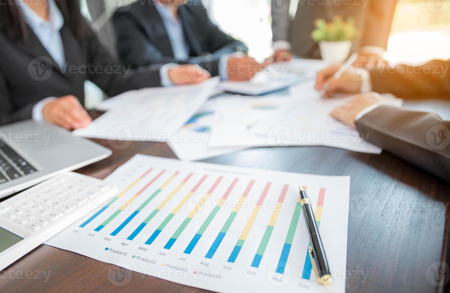 Group professional business people person working together to analyze in office, work together to discuss company financial statistics report, brainstorm ideas, and graph datum documents on the table. photo