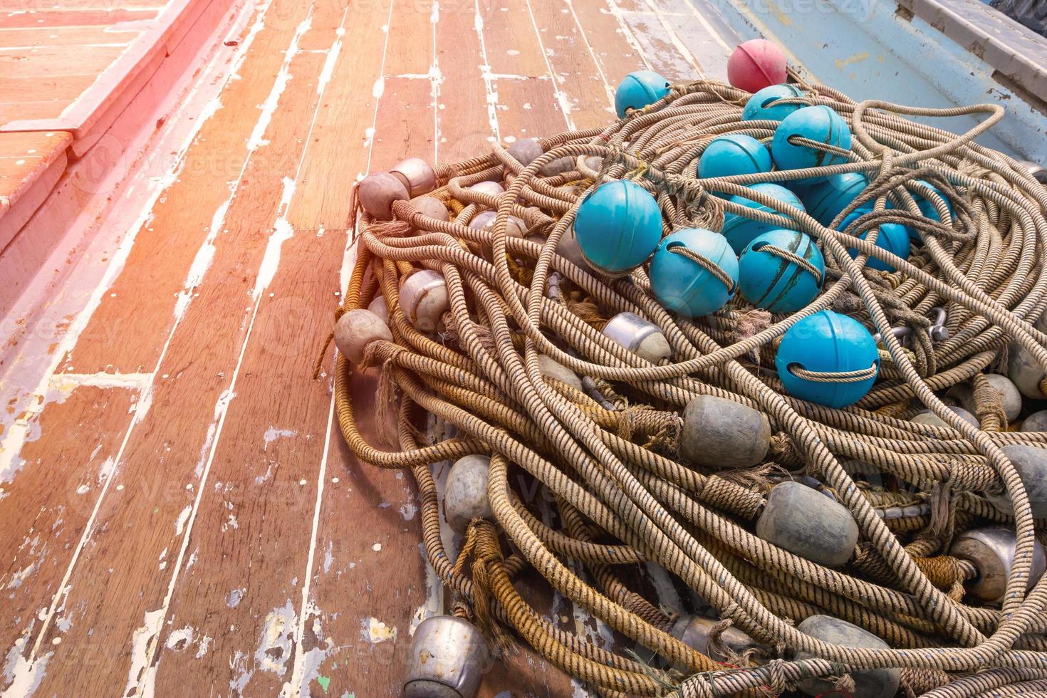 Plastic Float for fishing nets on ship photo