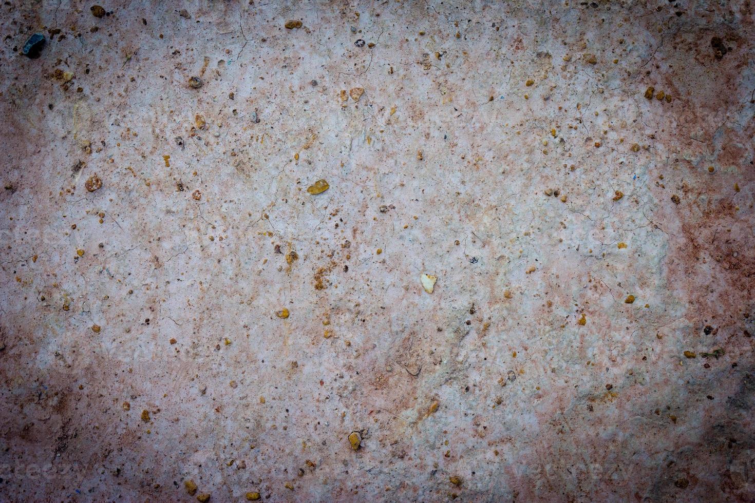 Ground light brown with sand. photo