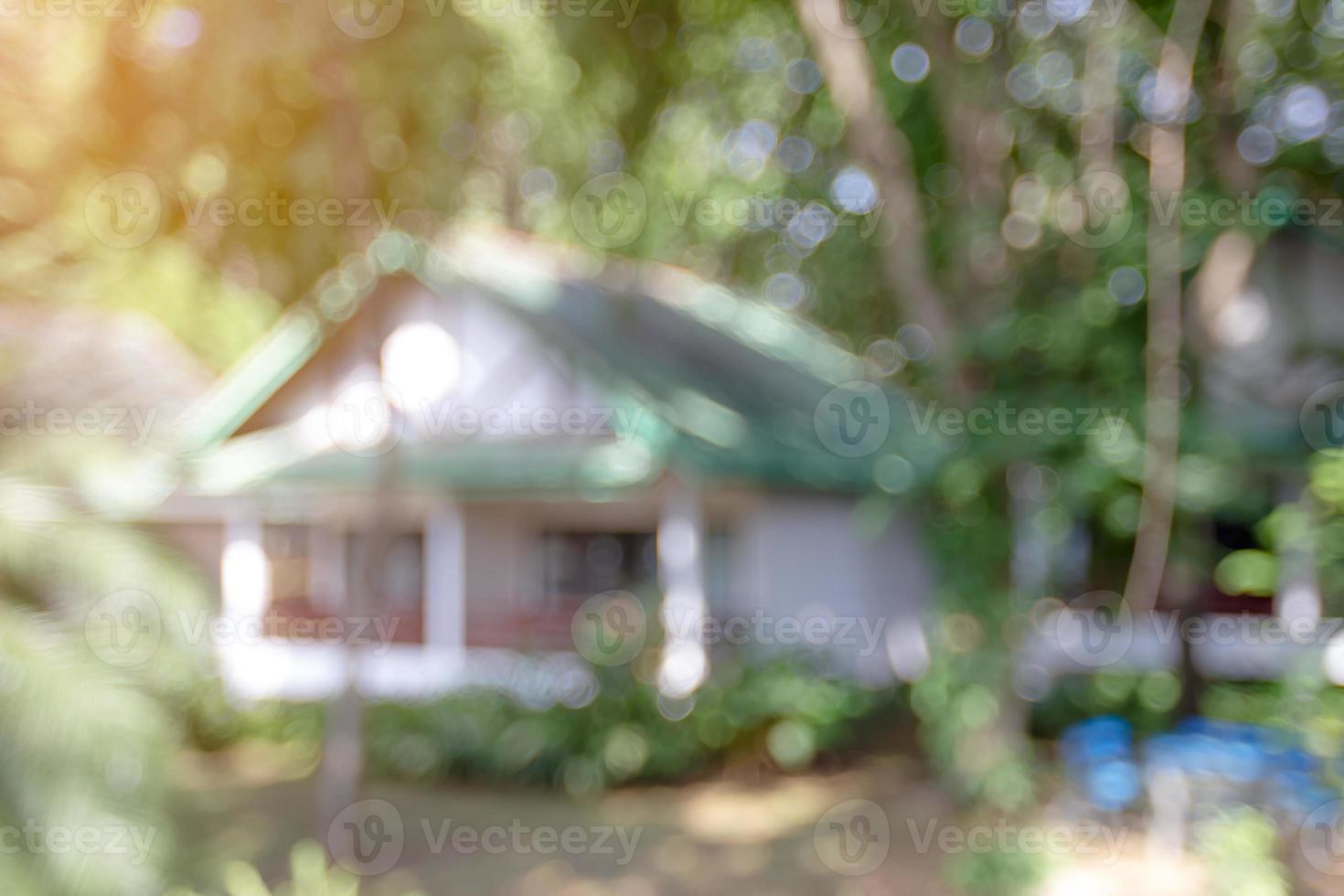 Blurry house in the forest background photo