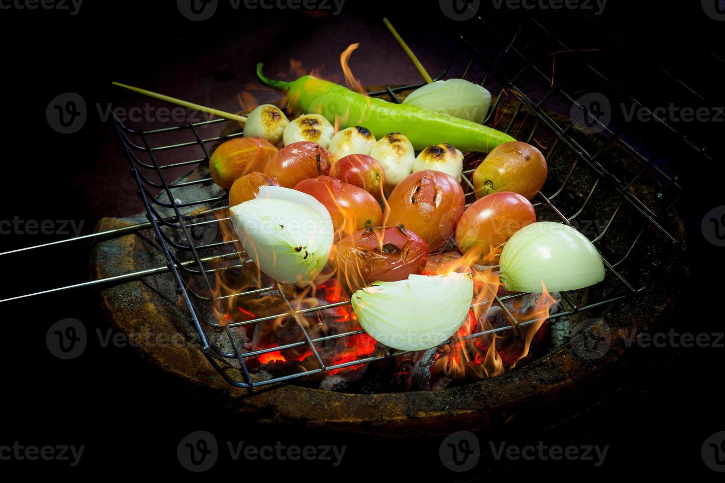 grilled vegetable and meat ball with charcoal stove photo