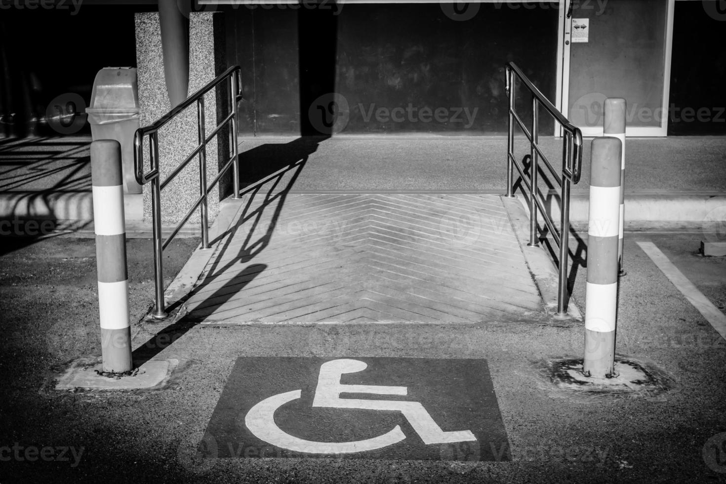 sign with ramps for disabled people,black and white picture photo