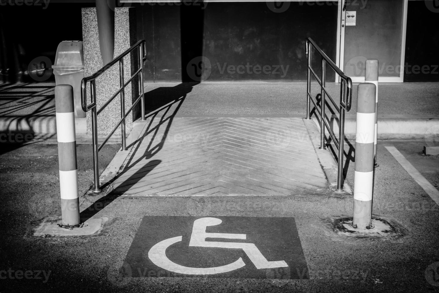 sign with ramps for disabled people,black and white picture photo