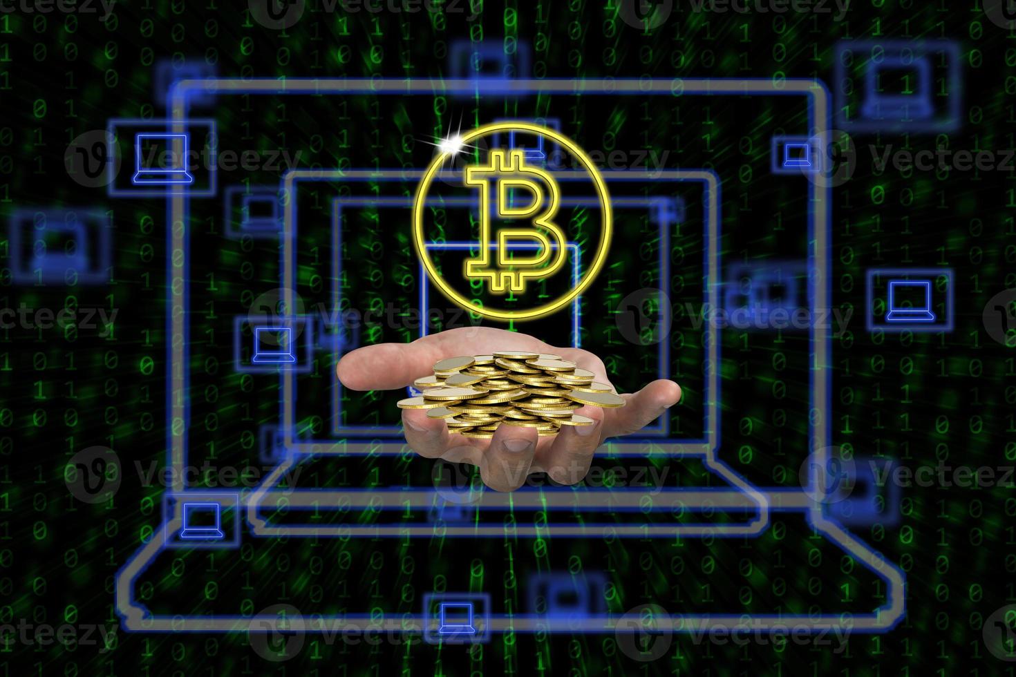 Human hand holding piles of coins with bitcoin symbol and laptop icons on binary background photo
