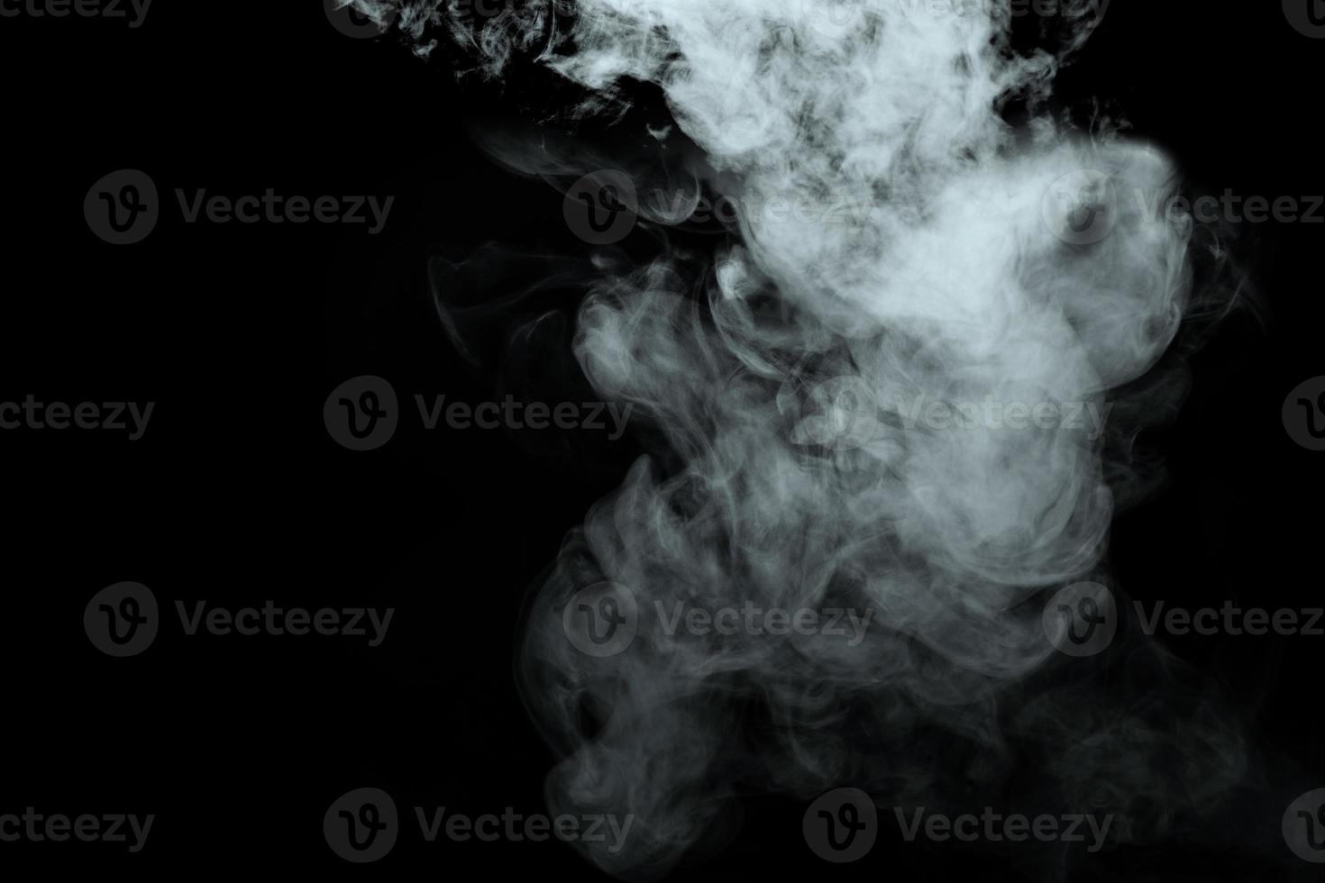 Abstract powder or smoke isolated on black background photo