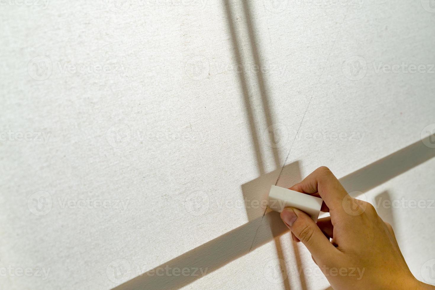 hand holding ruler with canvas background 10714256 Stock Photo at Vecteezy