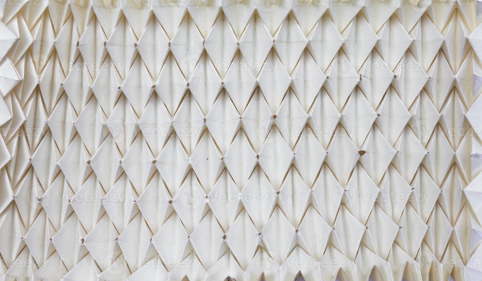 The paper was folded into notches photo