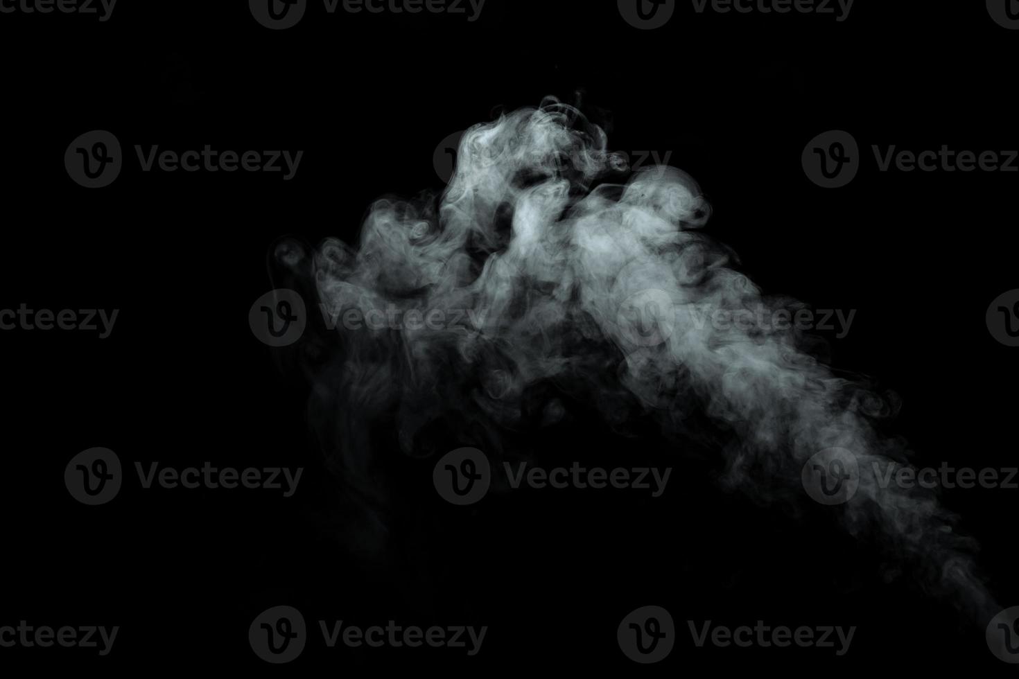 Abstract powder or smoke isolated on black background photo