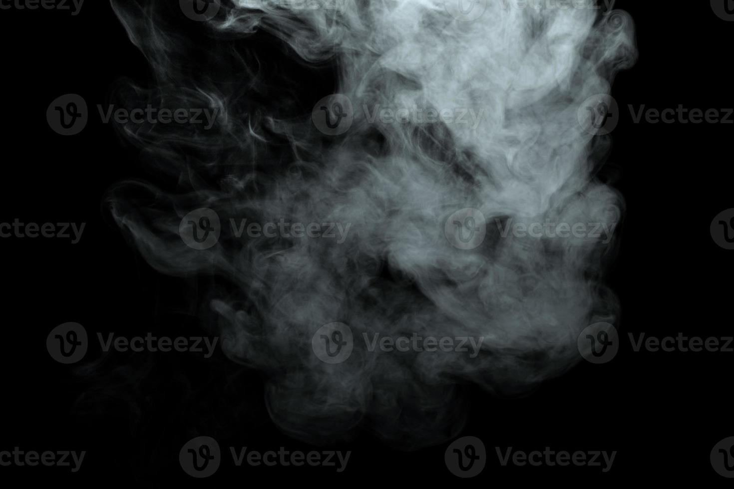 Abstract powder or smoke isolated on black background photo