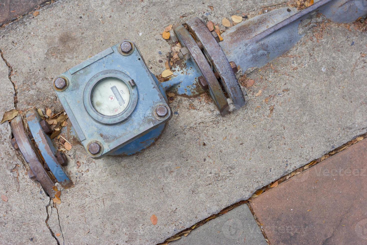 blue water meter closeup photo