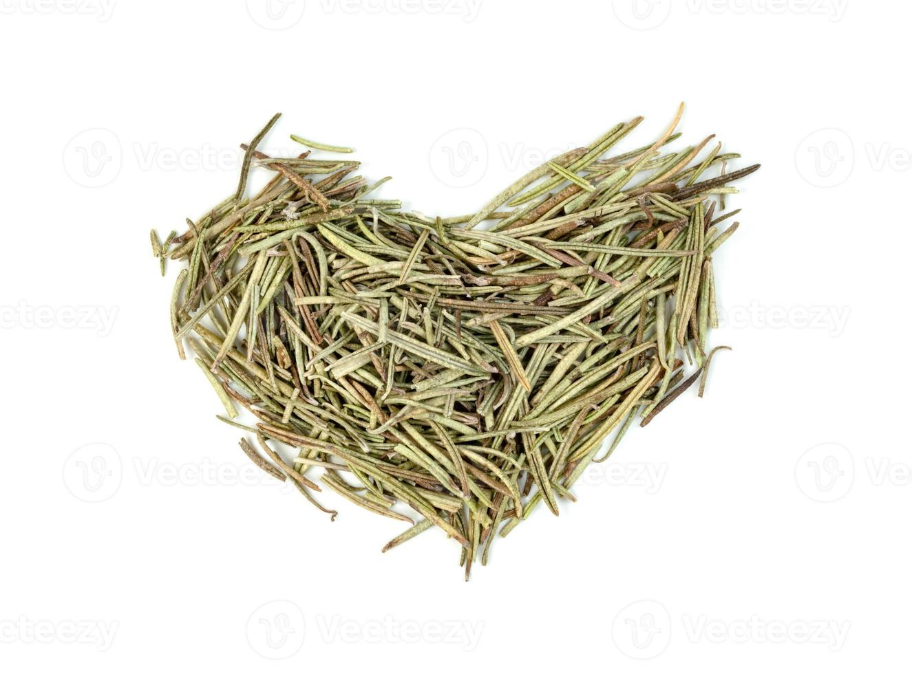 Dry rosemary pile isolated on white background photo