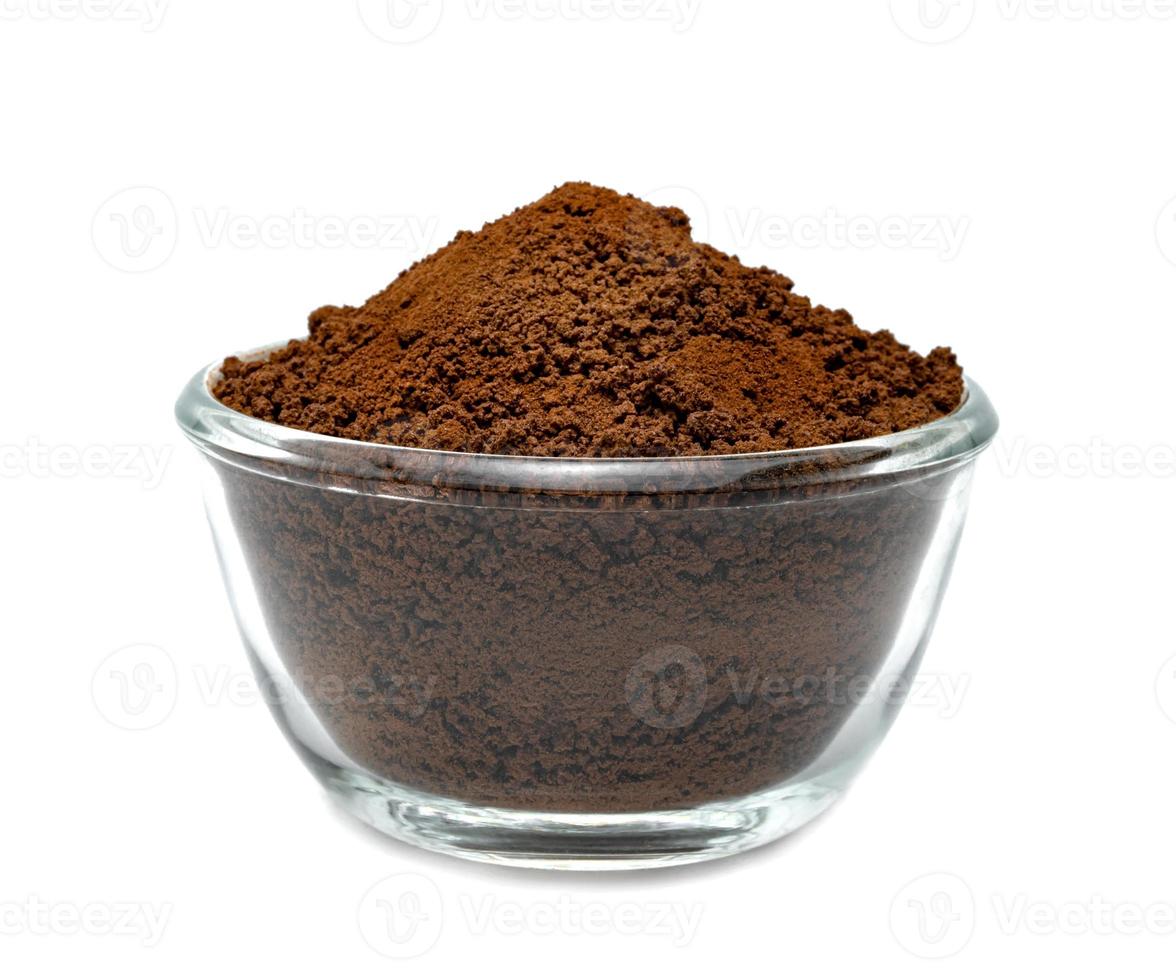 Instant coffee powder with glass bowl isolated on white background photo