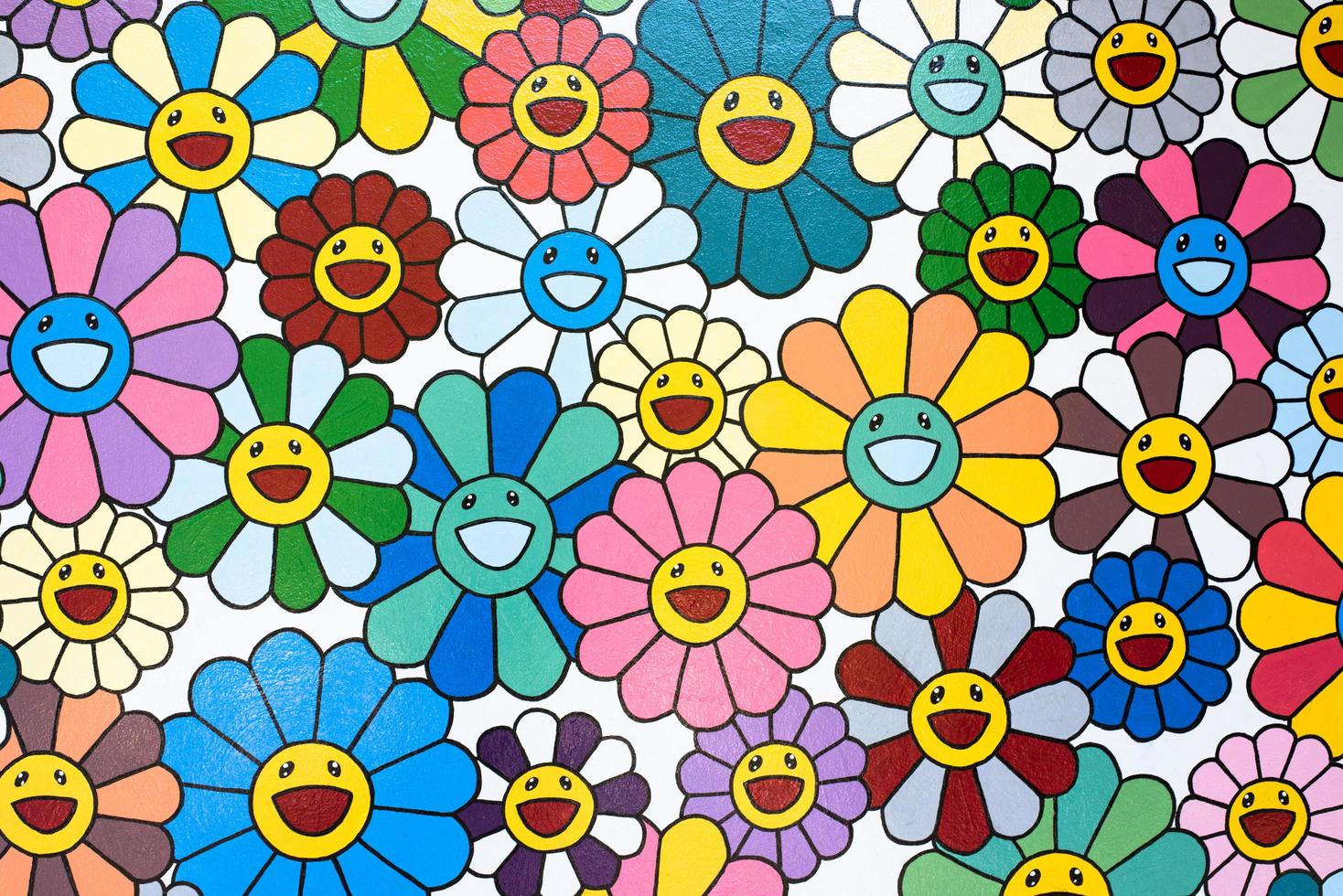 patrón transparente con flores sonrientes. icono de flor sonriente foto