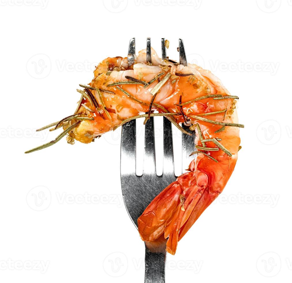 roasted peeled prawn and dry rosemary with fork isolated on white background ,grilled shrimp photo