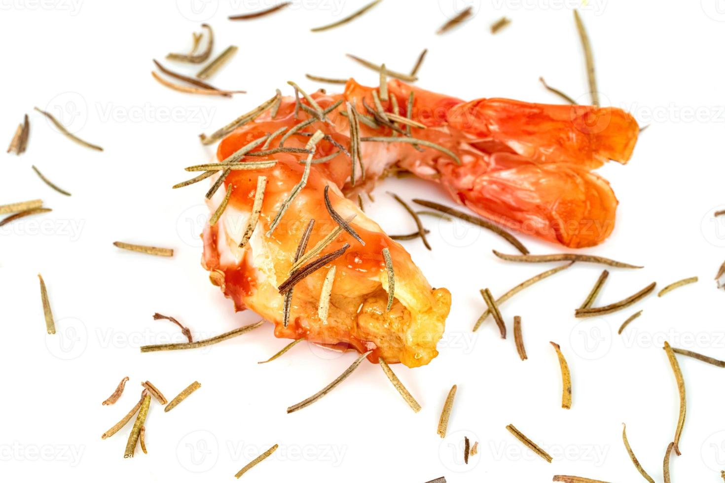 roasted peeled prawn with dry rosemary isolated on white background ,grilled shrimp photo