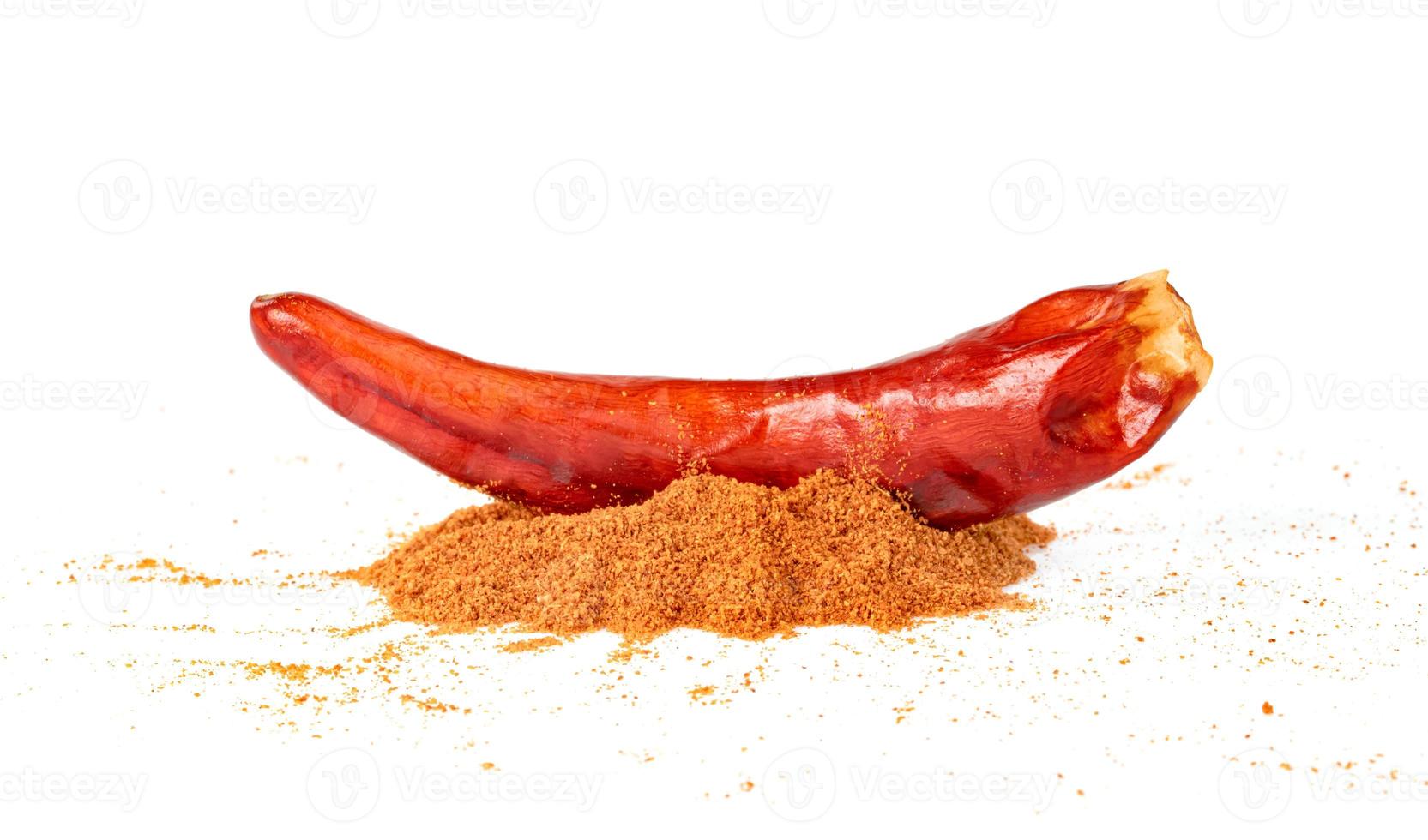 red ground paprika powdered or dry chili pepper isolated on white background photo