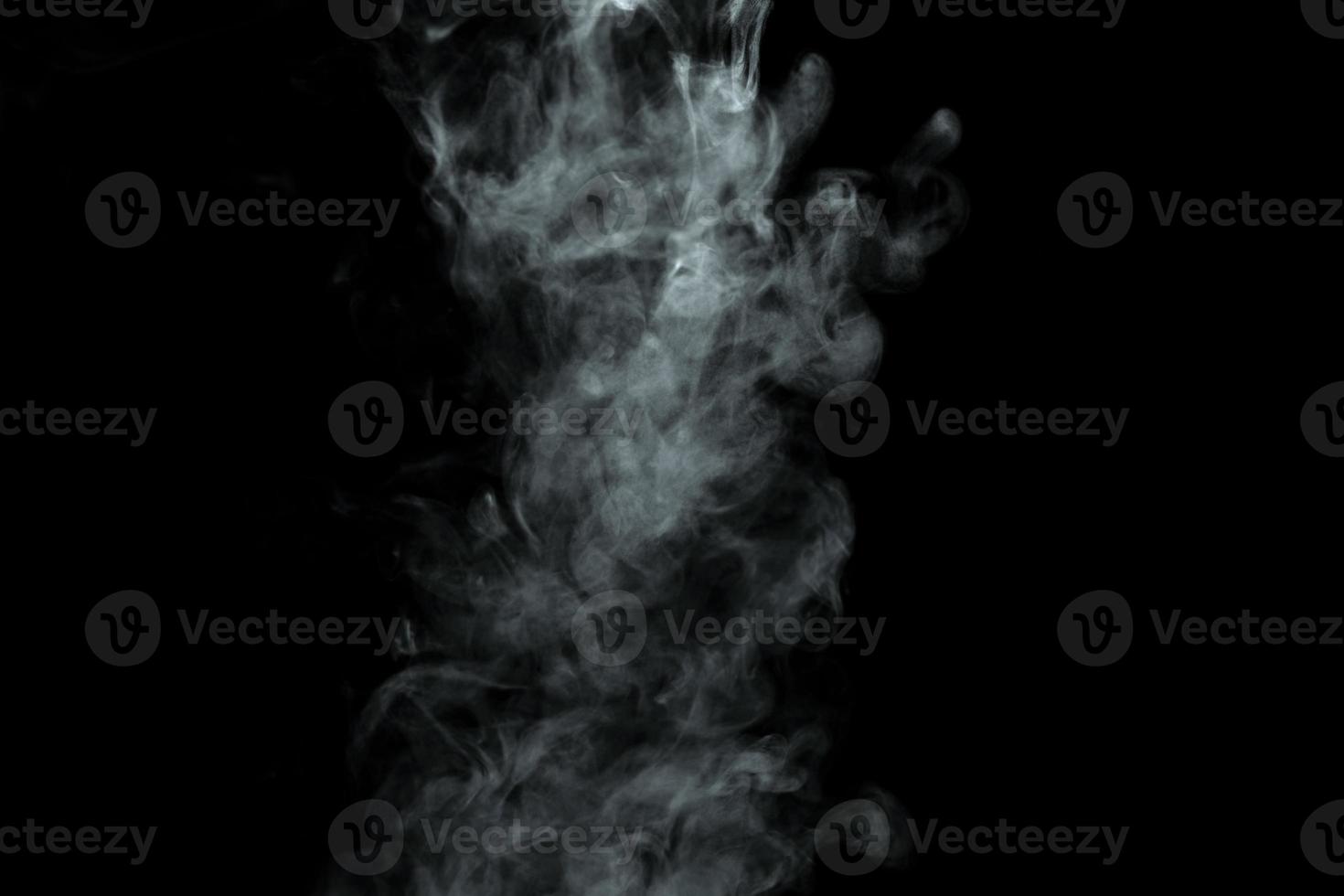 Abstract powder or smoke isolated on black background photo