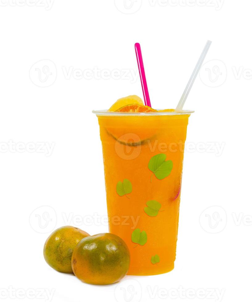 Slush ice with orange in Plastic Cup on white background. photo