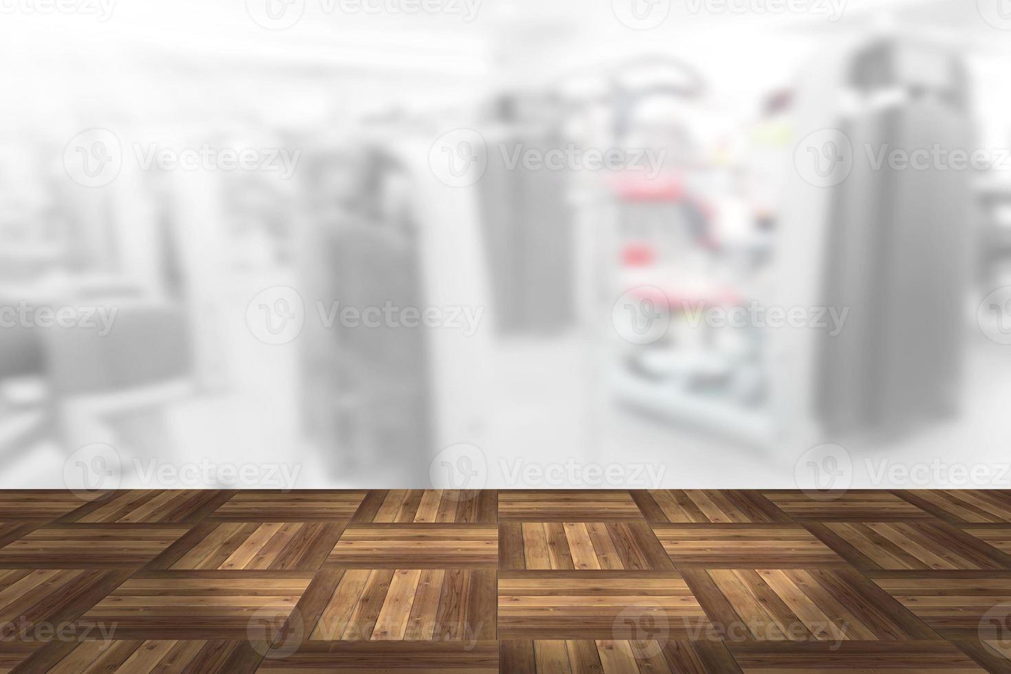 Empty wooden board space platform with blur fitness gym equipment background photo