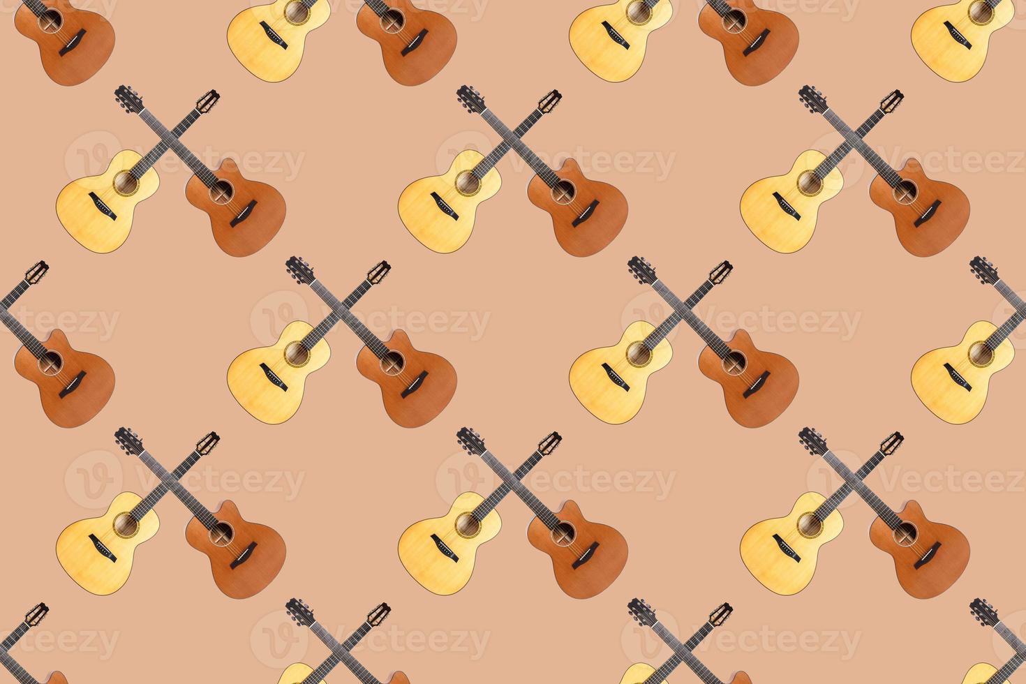 Seamless pattern of wood texture of lower deck of six strings acoustic guitar on orange background photo