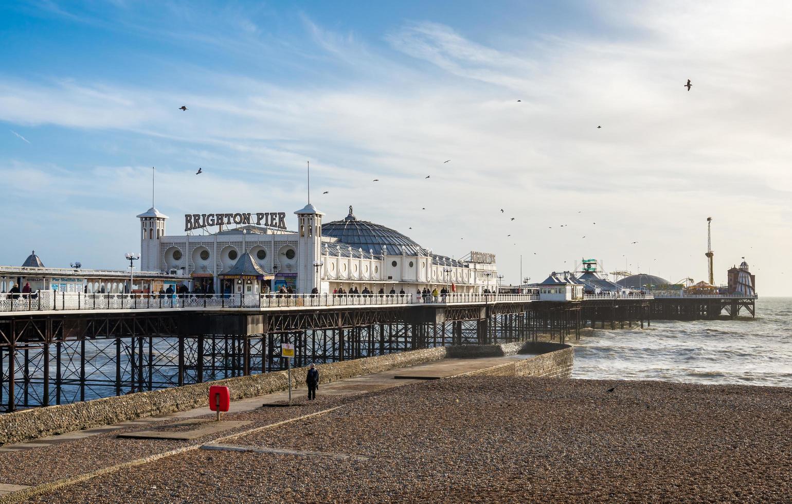 BRIGHTON, SUSSEX, UK - JANUARY 27. View of the pier in Brighton on january 27, 2013. Unidentified people. photo