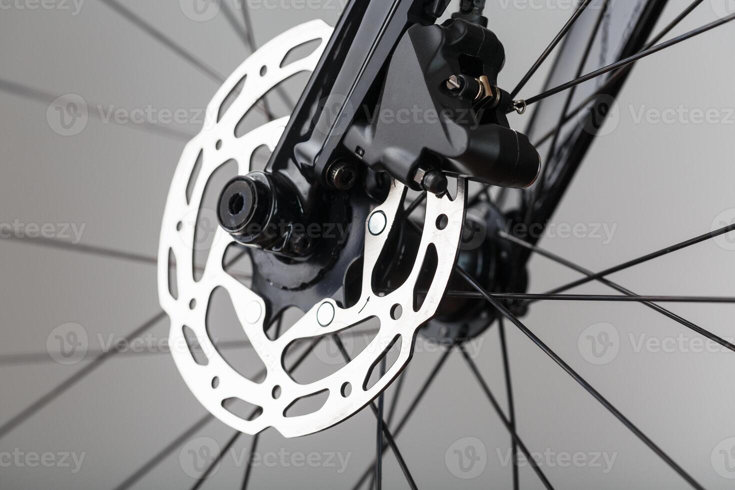 Bicycle brake rotor with hydraulic caliper. Brake system on a gravel