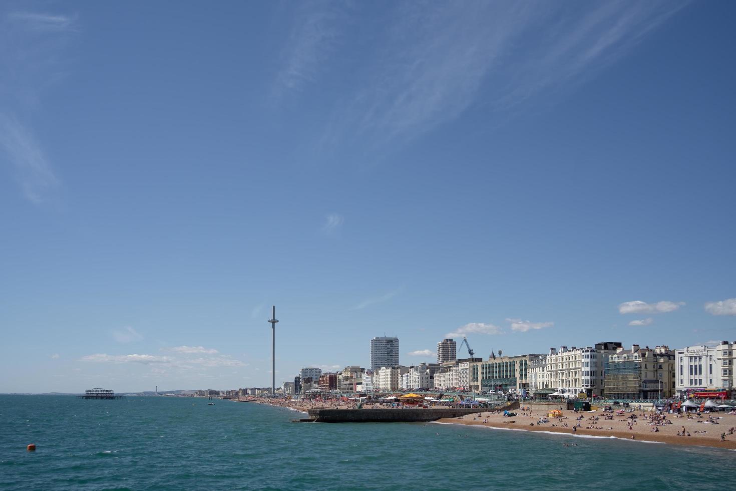 Brighton, East Sussex, UK - July 15, 2022. View of the beach in Brighton on July 15, 2022. Unidentified people photo