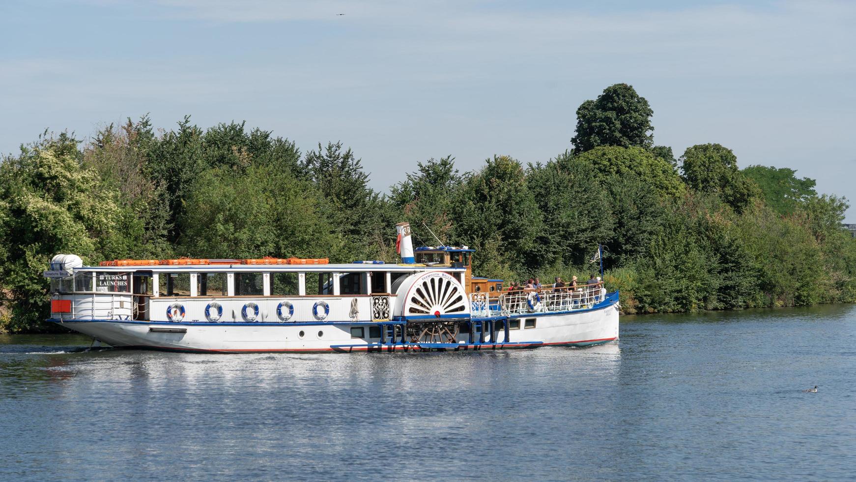 Surbiton Surrey, UK - July 15, 2022. Yarmouth Belle en route from Hampton Court to Kingston on July 15, 2022. Unidentified people photo