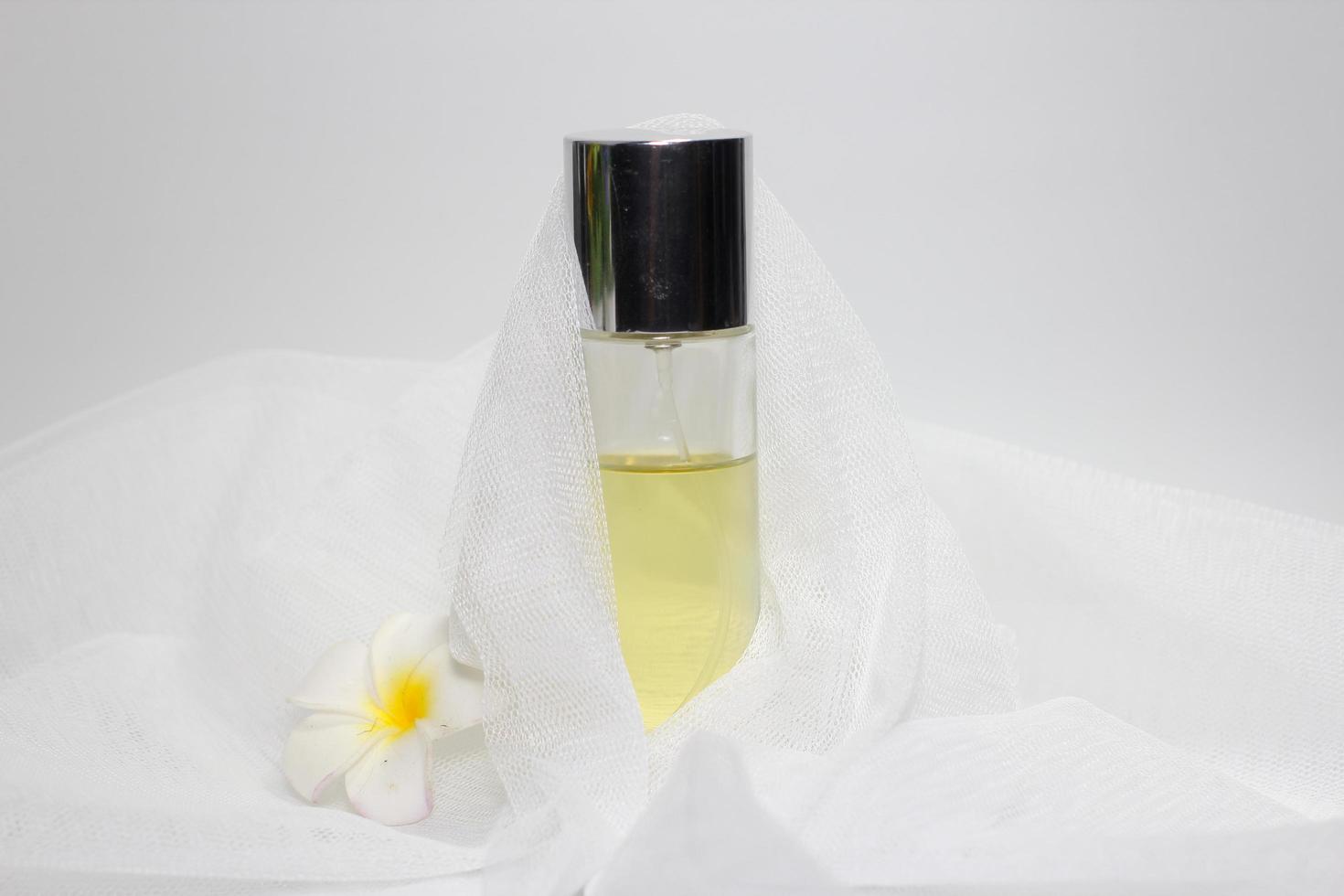 transparent parfum bottle in photo studio, Clear parfum glass bottle with spray cap