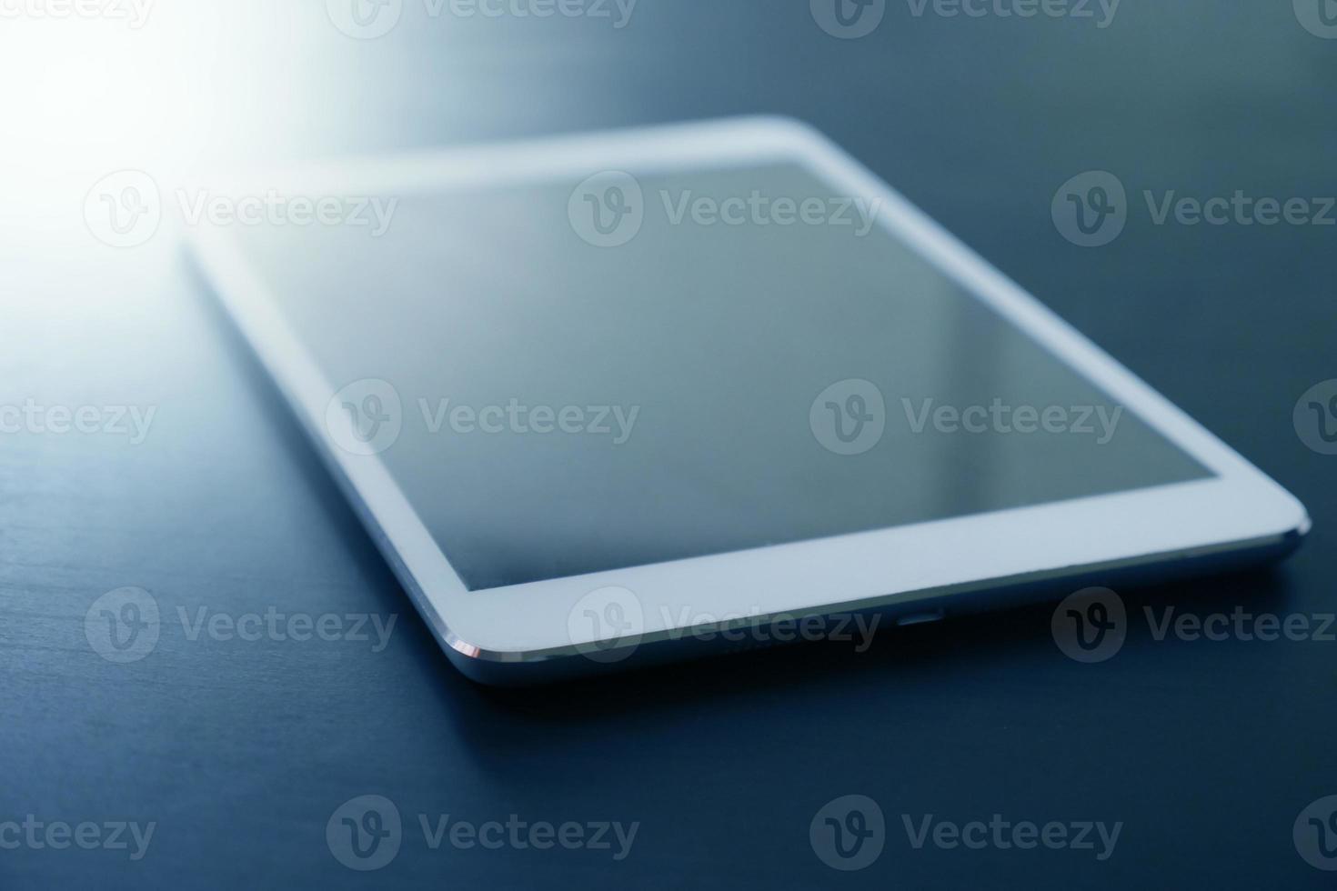 Modern computer tablet on the table, Soft focus photo
