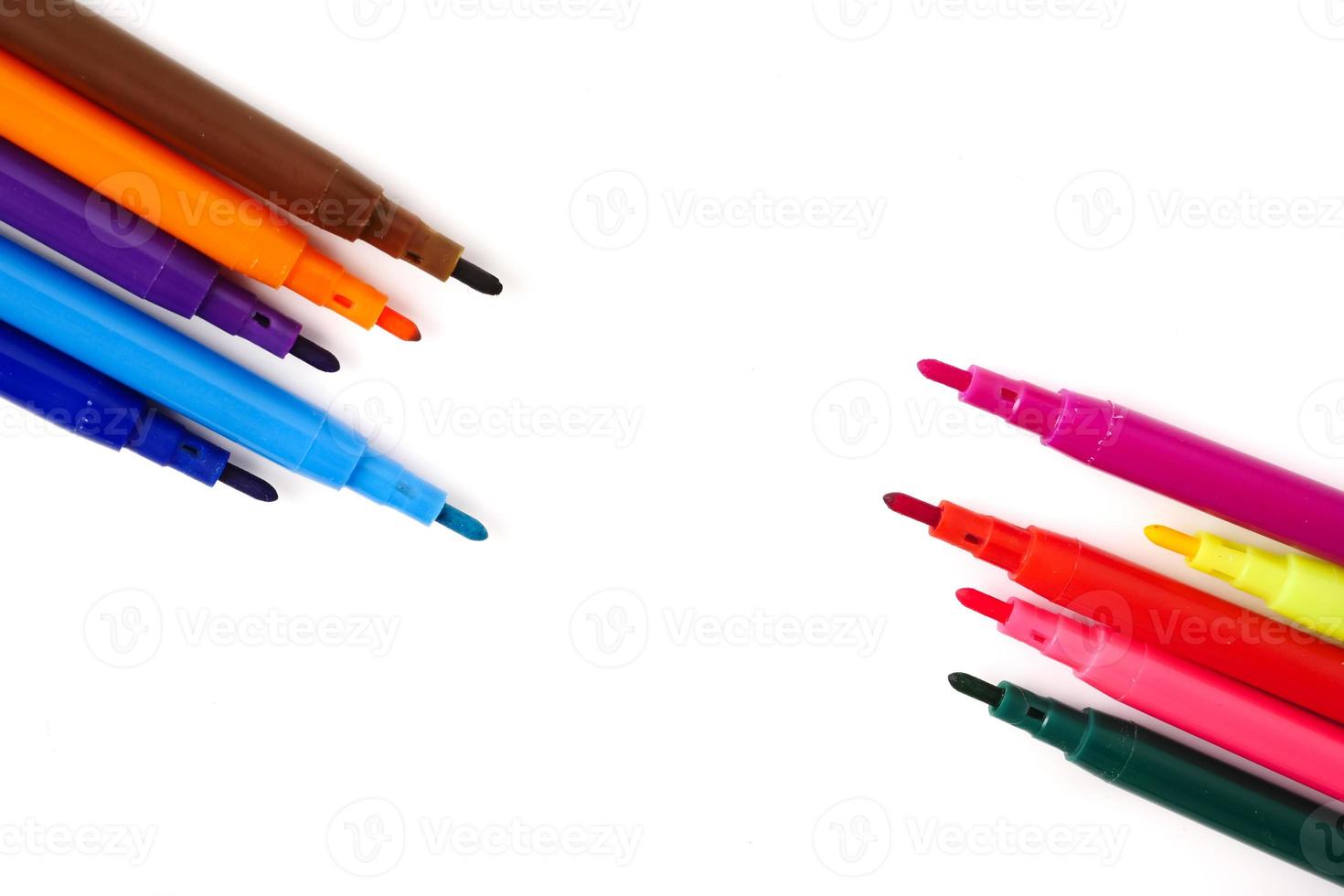 Magic colorful pens on a white background. Free space for text photo