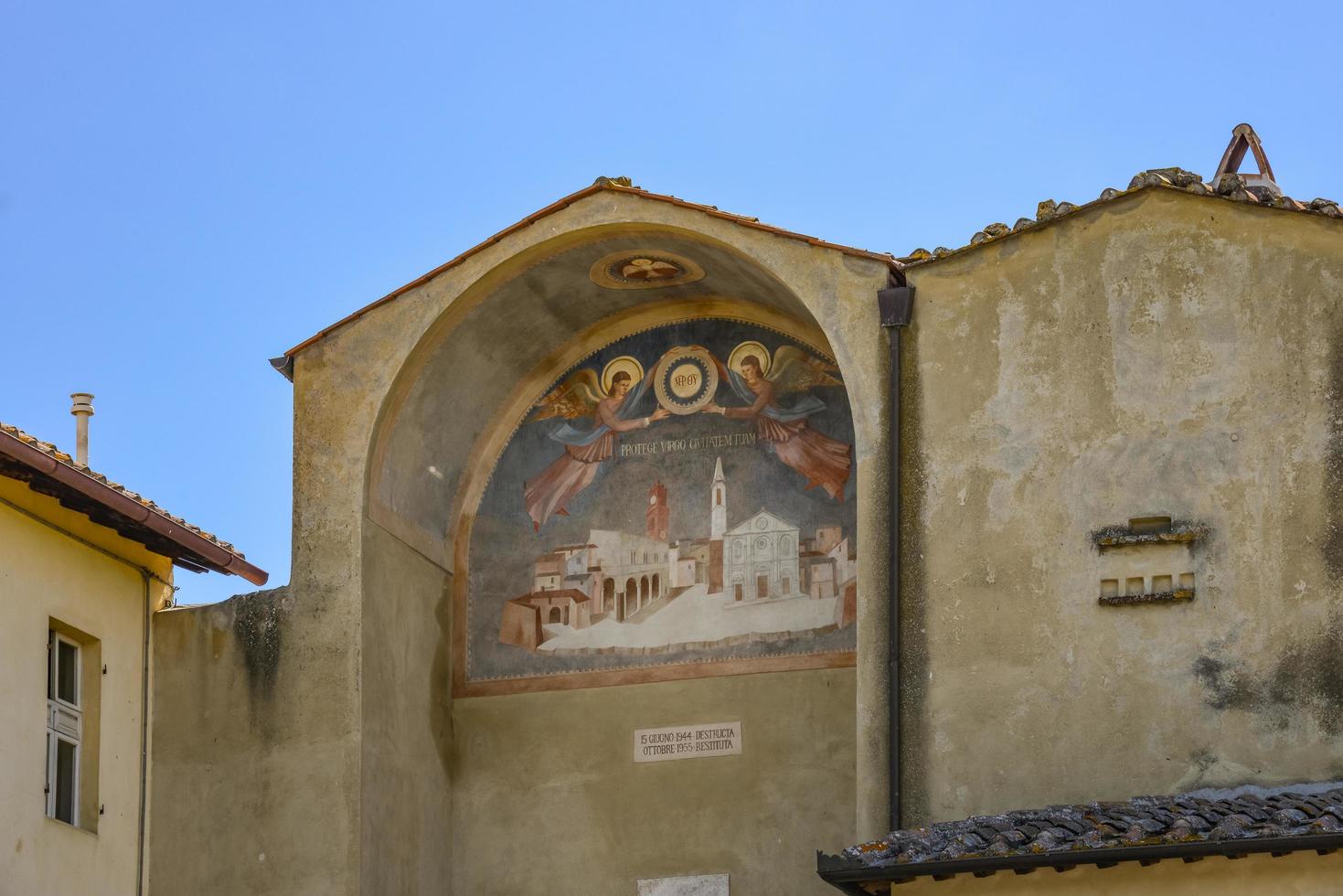 PIENZA, TUSCANY, ITALY - MAY 18. Mural on a wall at the entrance to Pienza Italy on May 18, 2013 photo