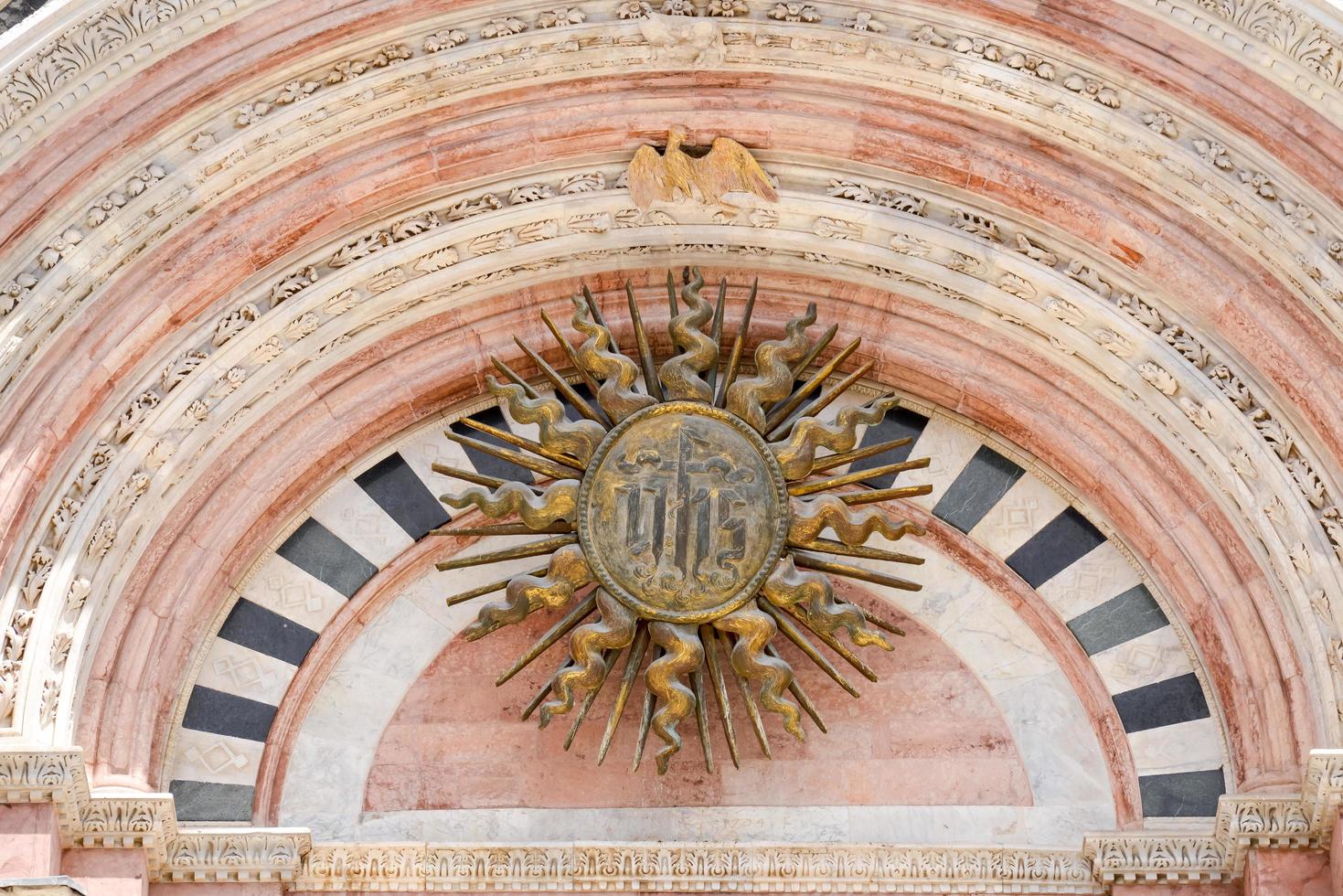 SIENA, TUSCANY, ITALY - MAY 18. Golden shield at the Cathedral in Siena, Tuscany, Italy on May 18, 2013 photo