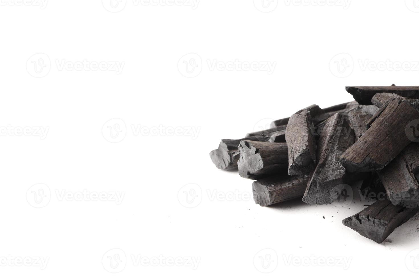 Charcoal on white background. Free space for text photo