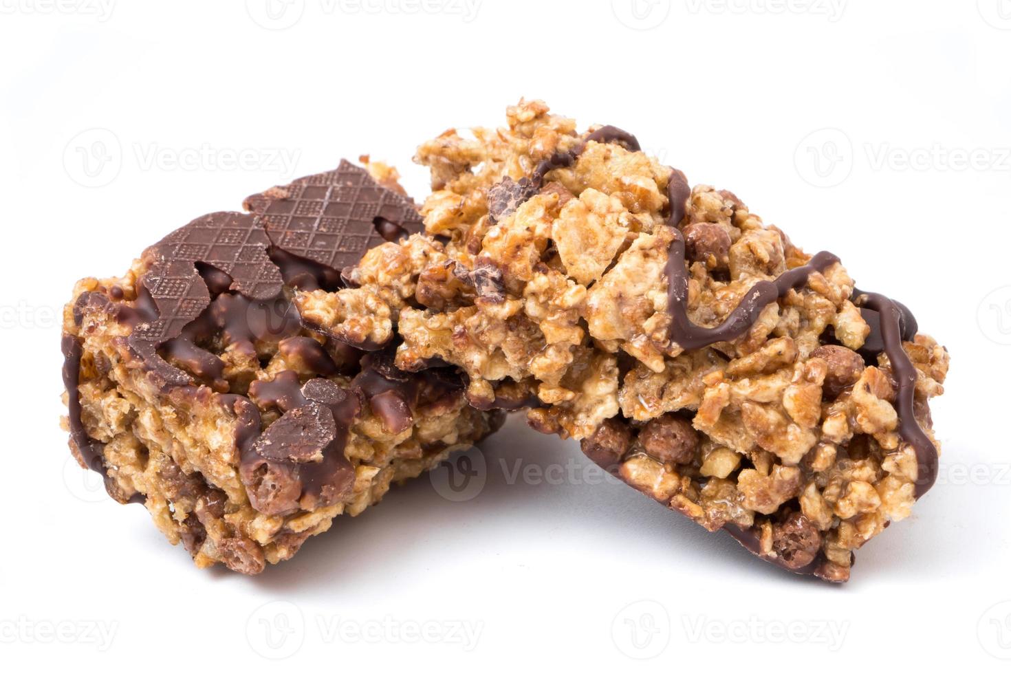 Chocolate cereal bars with wheat whole grain and chocolate on a white background. photo