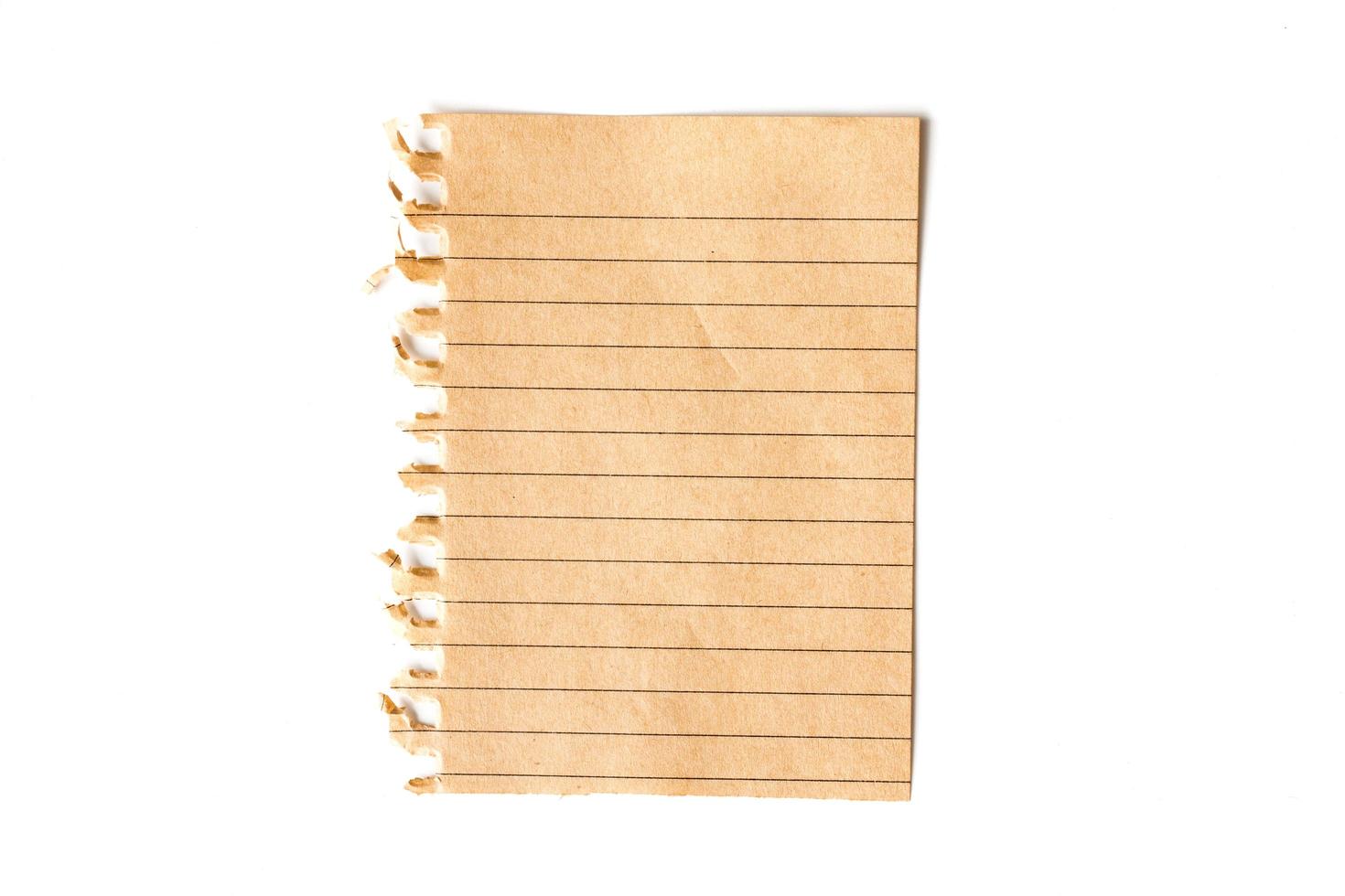A piece of note paper on a white background. photo