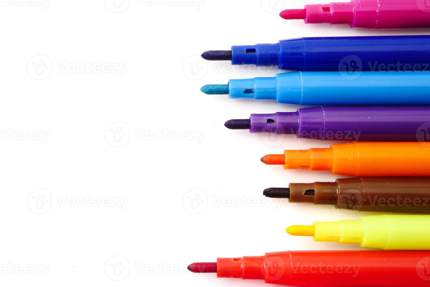 Magic colorful pens on a white background. Free space for text photo