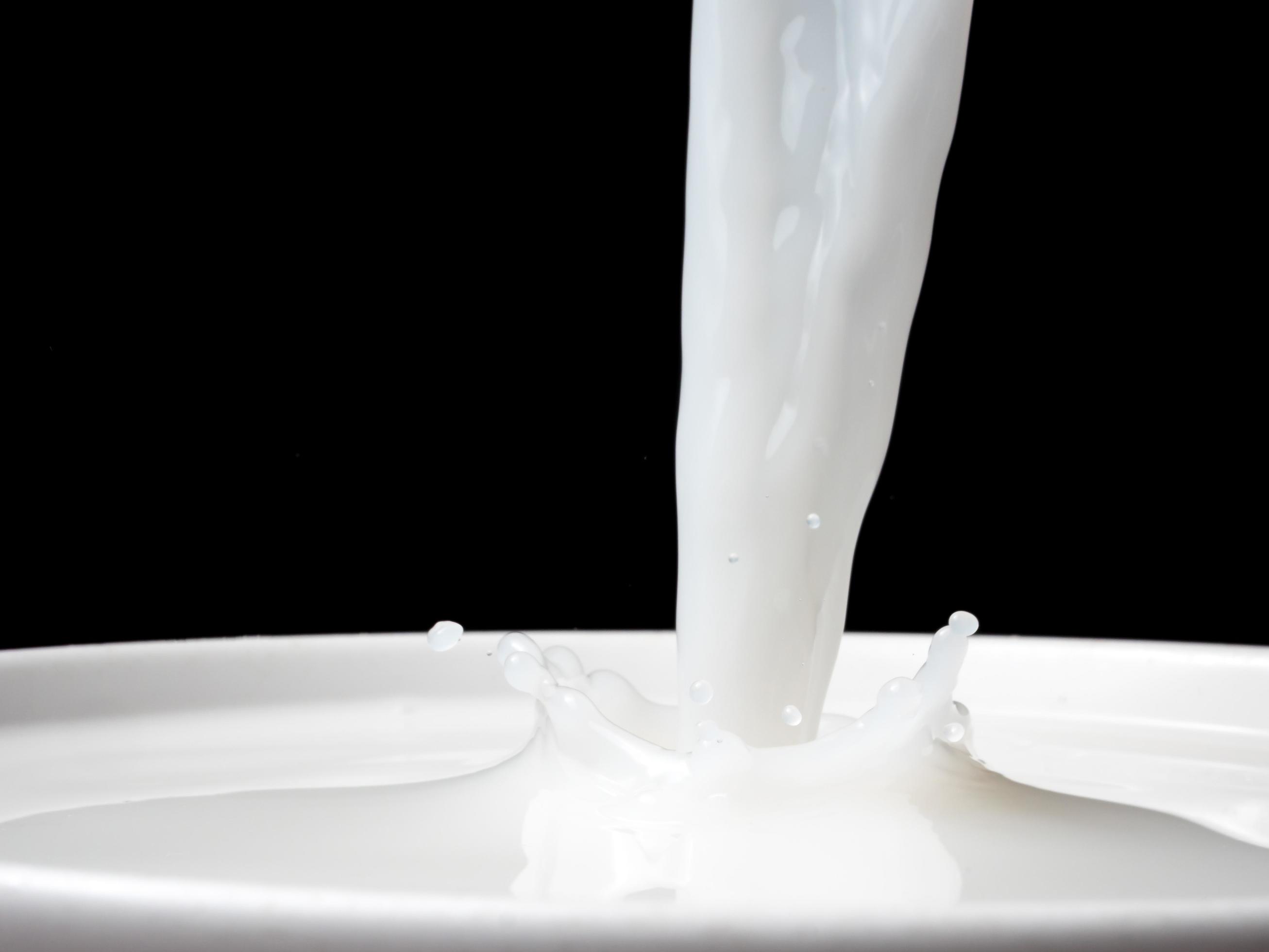 Splash Of Milk From A Cup On Black Background 10718409 Stock Photo At splash-of-milk-from-a-cup-on-black-background-10718409-stock-photo-at