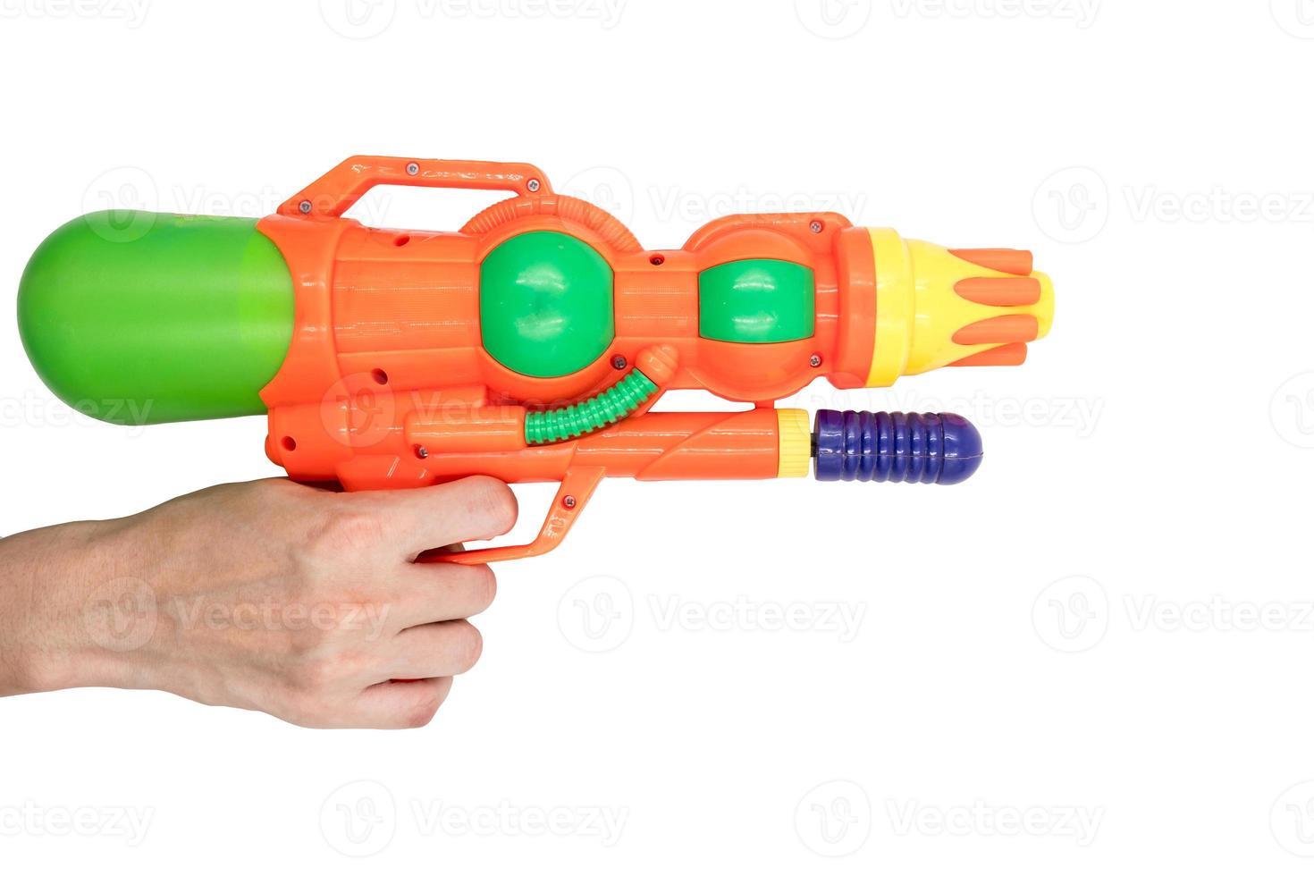 Hands holding gun water toy on white background. photo