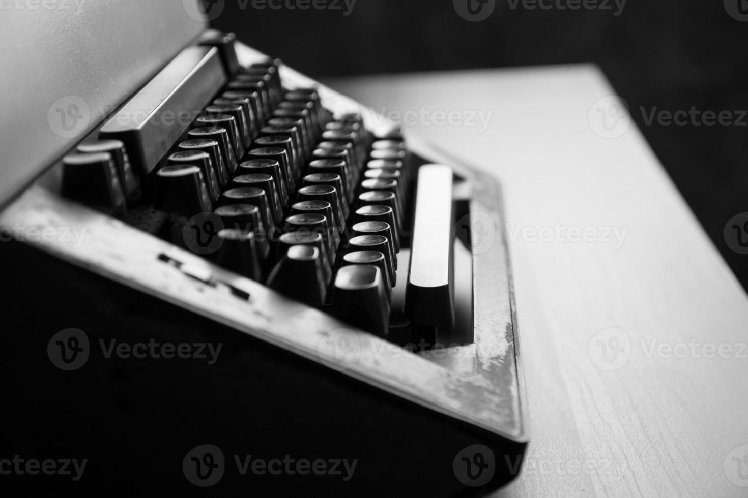 Close up of old typewriter on the table. Black and White tone photo