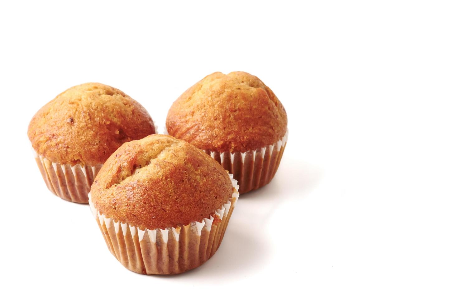 Banana cupcakes on a white background, Free space for text. photo