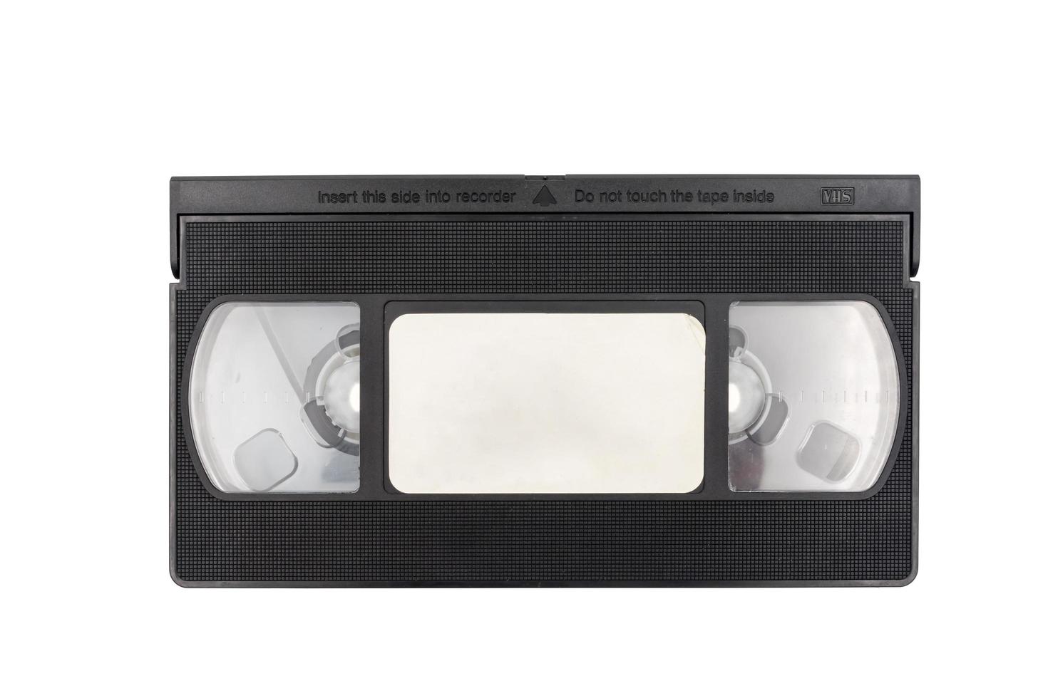 Old video cassette tape on white background. photo