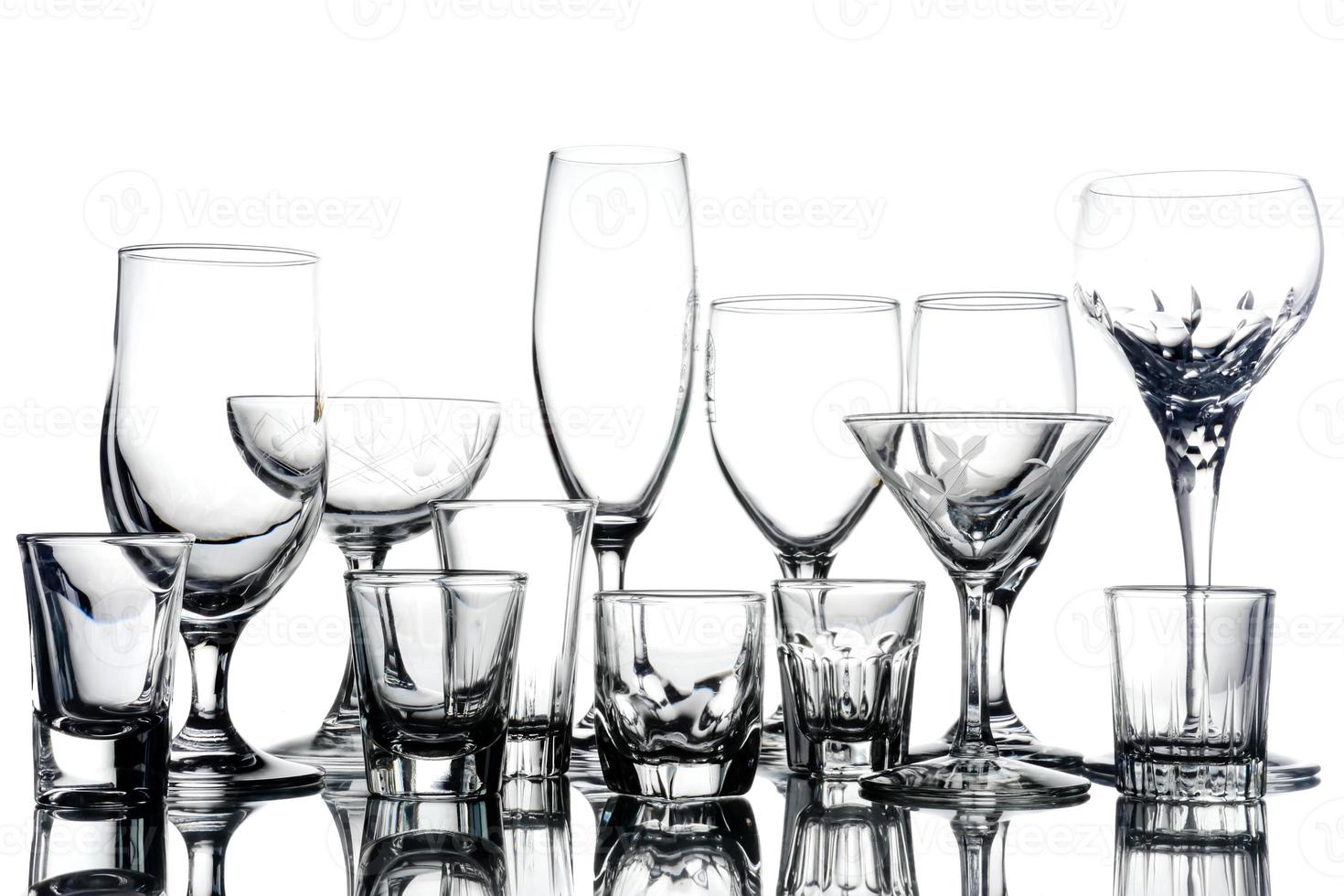 Collage of empty glasses on white background. photo