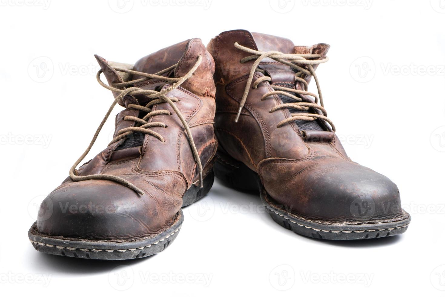 Men's brown leather shoes on white background. photo