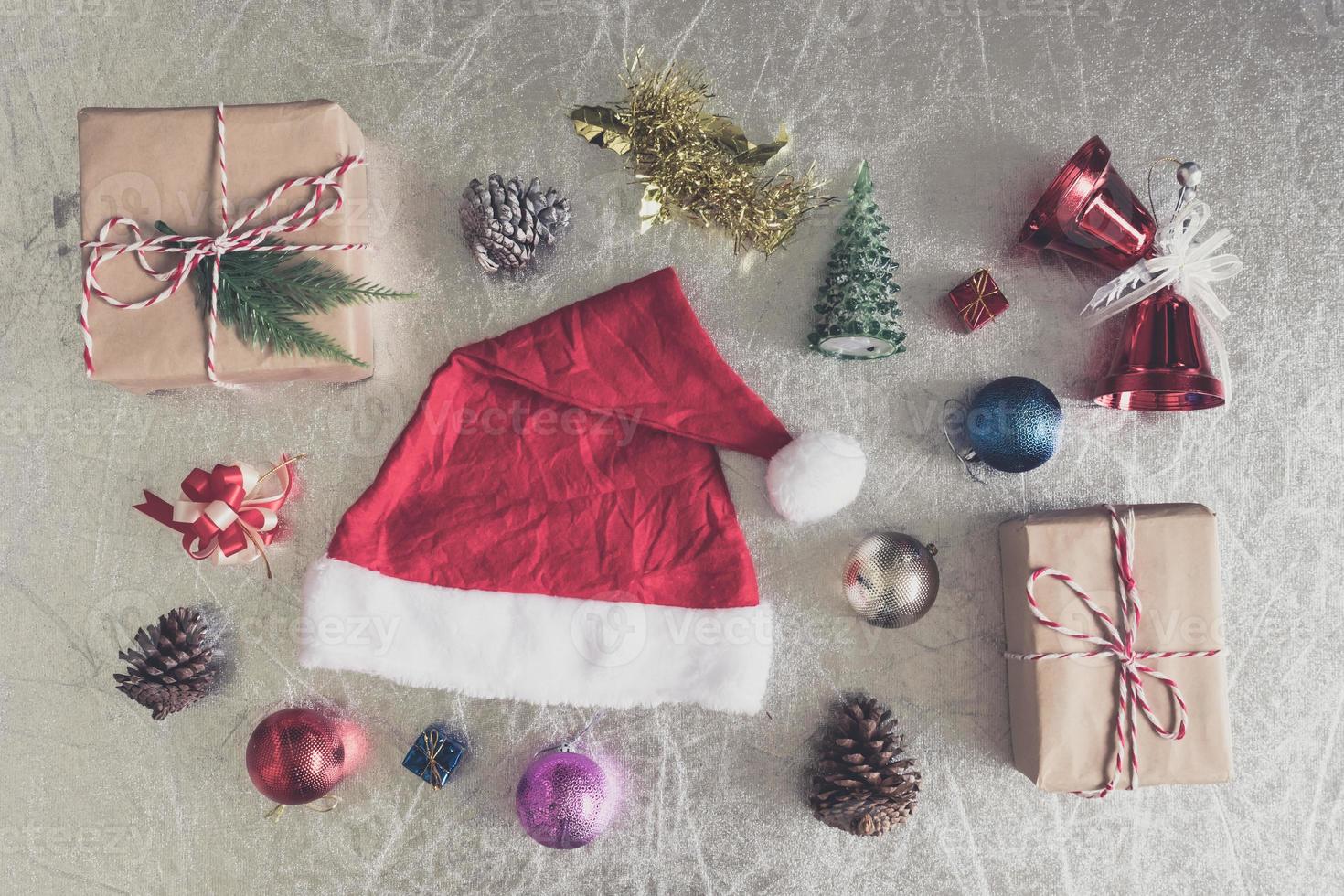 Top view of Christmas decorations on silver background. photo