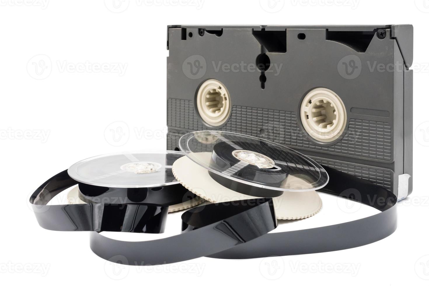 Video cassette tape and reel on white background. photo