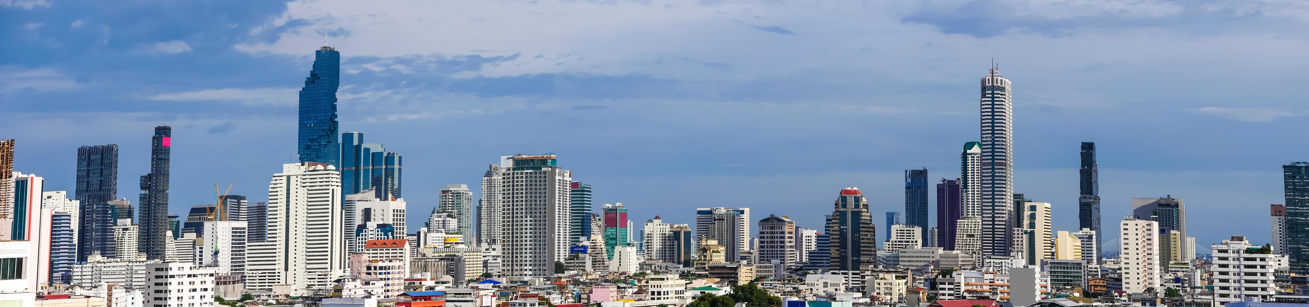 Panorama image - Modern building in business district at Bangkok city, Thailand. photo