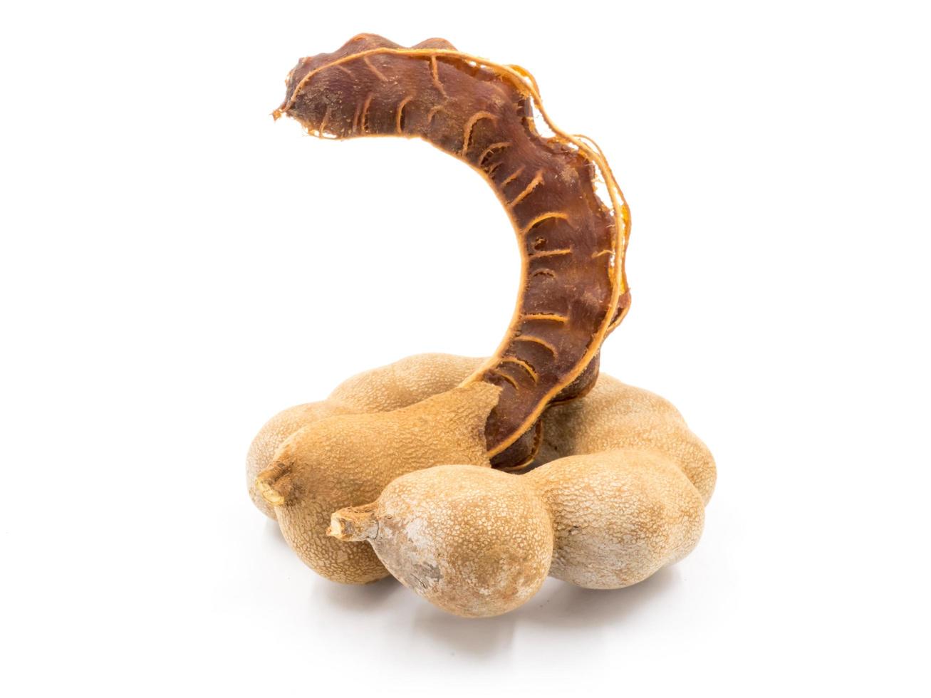 Sweet tamarind on white background photo