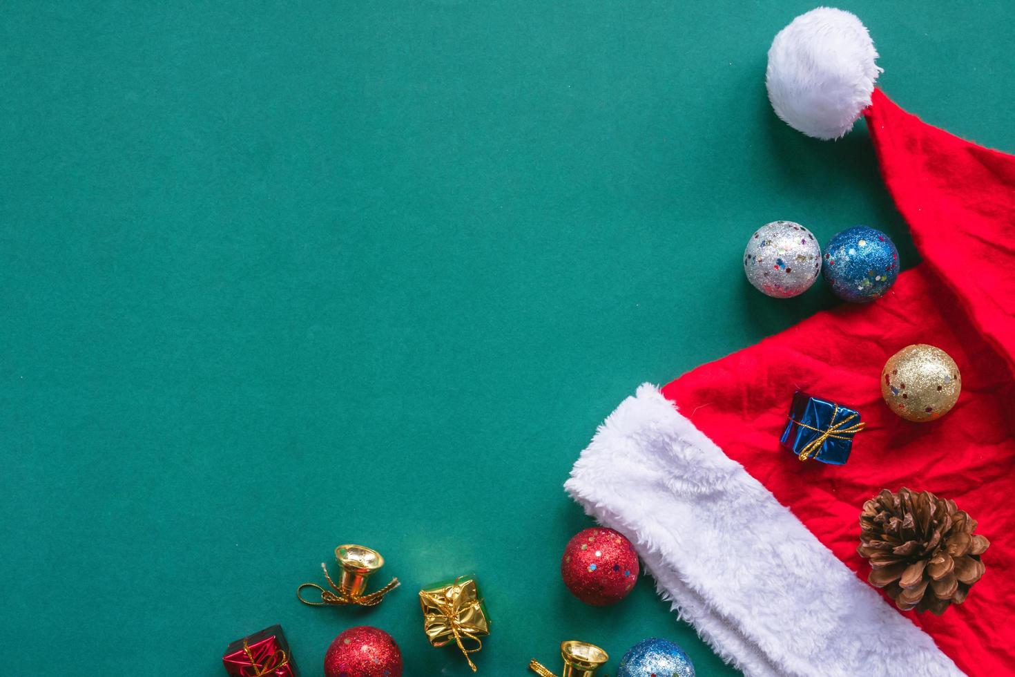 Top view of christmas decoration on green background. Free space for text photo