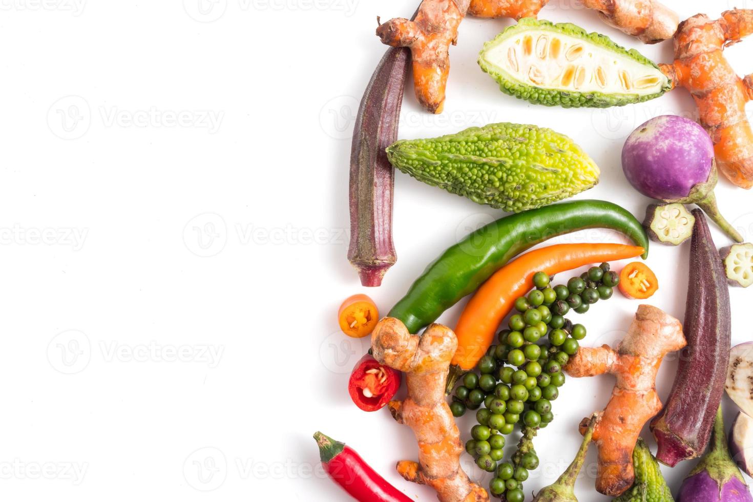 Group of fresh vegetables and herbs on white background. Free space for text photo